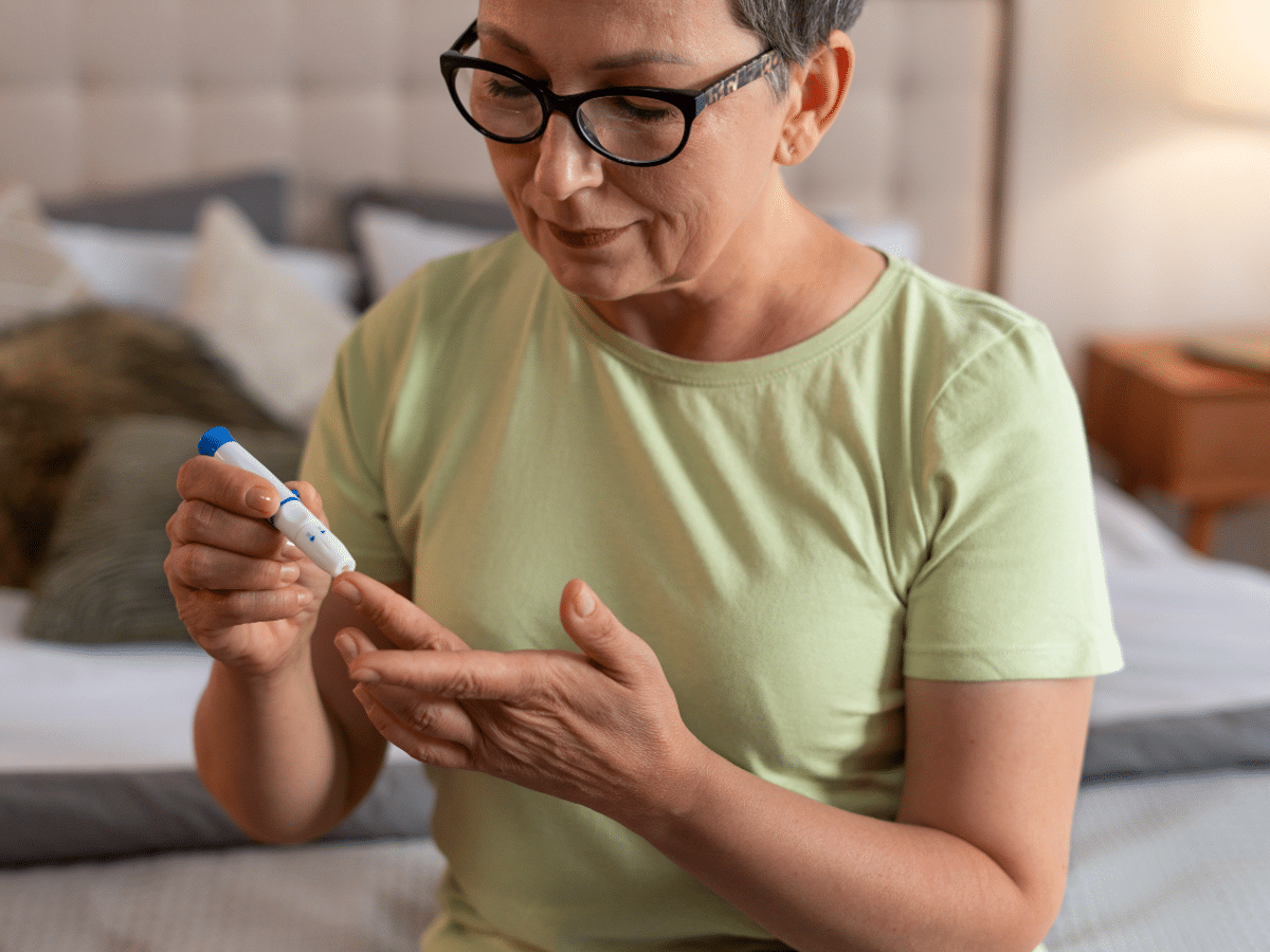 woman testing blood sugar levels