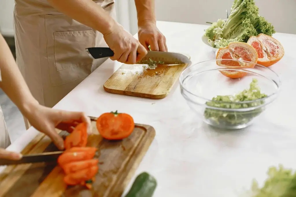 chopping vegetables in the kitchen